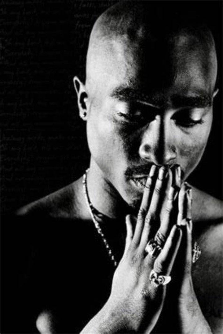 Exploring the Symbolism of Pac Praying Hands