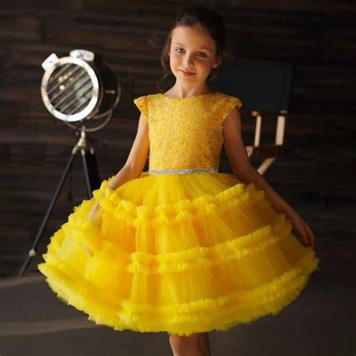Unveiling the Charm of the World Star Yellow Dress Girl